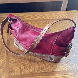 The Sak Red Leather Shoulder Bag with Tan Trim and Strap